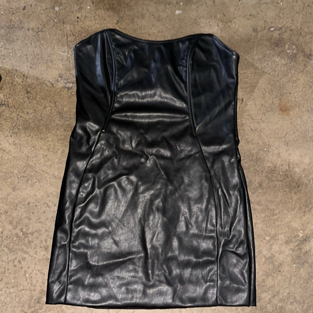 Black leather dress . Strapless